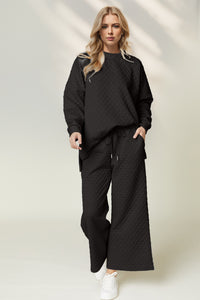 Thumbnail for Double Take Checkered Slit High-Low Round Neck Top and Wide Leg Pants Set